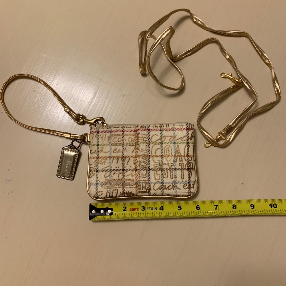 Coach Authentic wristlet.